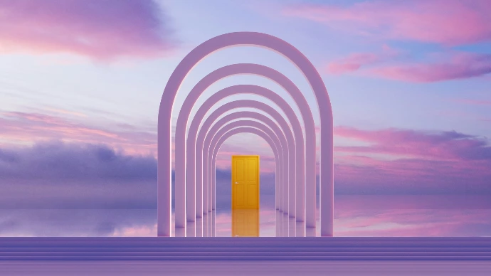 Archway leading to a golden door at sunset